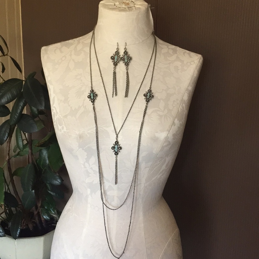 Clair’s silver tone necklace and earrings